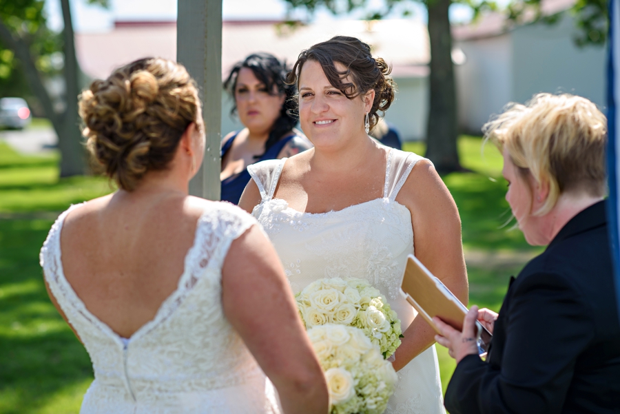 A lovely bride saying her vows during her wedding ceremony.
